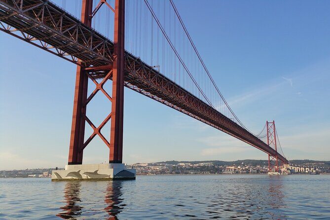 Lisbon Day Boat Tour with wine and guided tour - The Sum Up