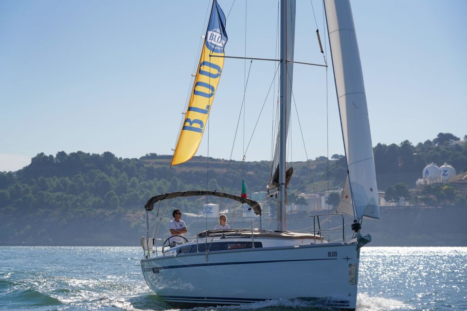 Lisbon: Luxury Private Sailing Boat Cruise on River Tagus - Passing Under the 25th April Bridge