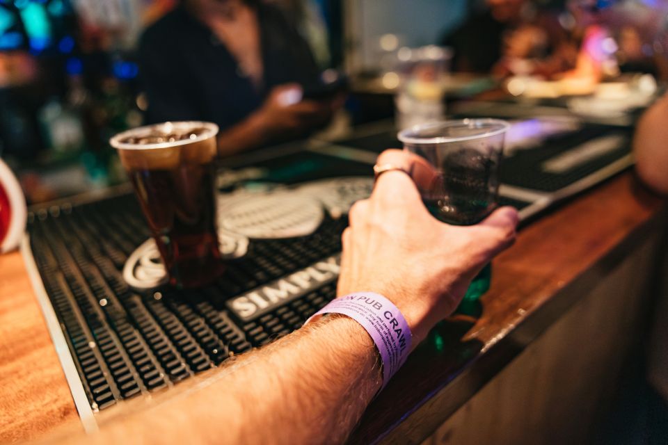 Lisbon: Pub Crawl With Open Bar, Shots, & VIP Club Entry - Iconic Neighborhood Exploration