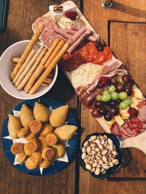 Lisbon Sailing Boat Tour: Beach Stop with snacks and drinks - In The Sum Up