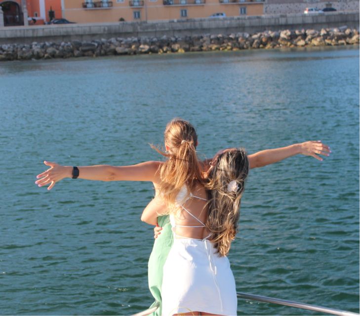 Lisbon: Sailing Romantic Sunset With Overnight and Meals - Wine and Welcome Drink