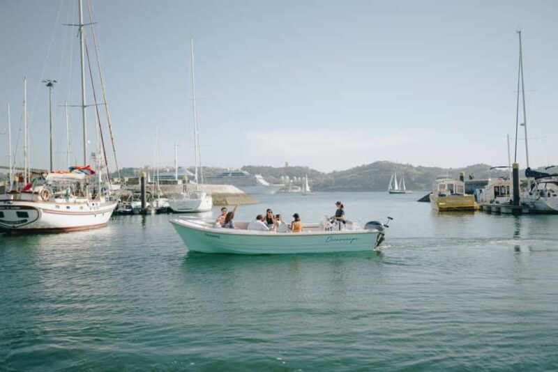 Lisbon Sunset Boat Tour with local Snacks & Drinks - Key Points