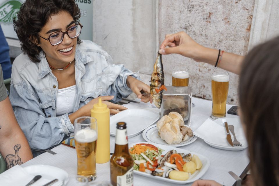 Lisbon: Tipsy Food Walking Tour With Snacks and Drinks - Tasting the Seven Wonders of Cuisine