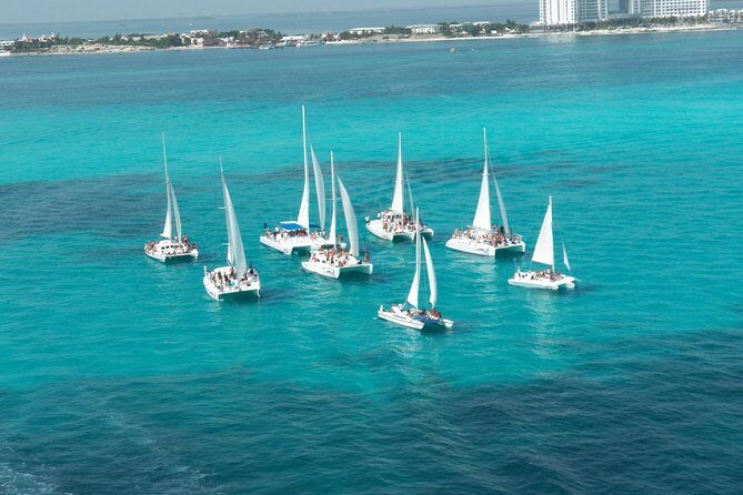 Live this unique experience. Catamaran to Isla Mujeres Tour. Open Bar included. - FAQ