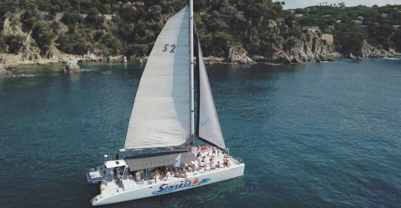 Lloret De Mar: Sunset Catamaran Cruise With DJ and Drinks - Inclusions and Exclusions