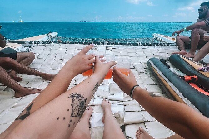 Luxury Catamaran to Isla Mujeres, Snorkeling, Buffet and Ice Bar - Authenticity and Traveler Feedback