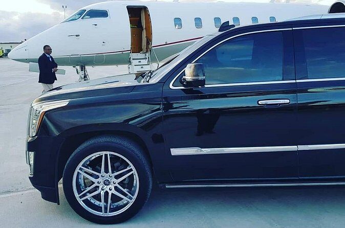 Luxury Escalade Cadillac Private Roundtrip Transportation - The Sum Up