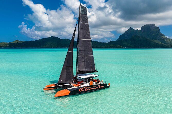 LUXURY PRIVATE Catamaran : Full-Day Sail & Polynesian Motu Lunch - Afternoon Exploration and Return