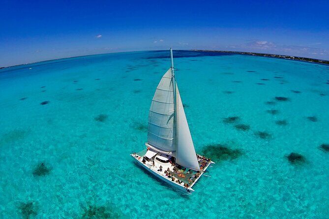 Luxury Sailing to Isla Mujeres with Lunch and Premium Open Bar - Practical Considerations and Booking Tips