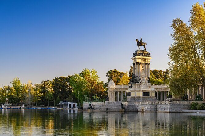 Madrid Bike Tour with Churros and Wine, Ham, and Cheese Upgrade - Key Points