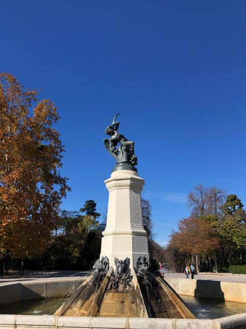 Madrid: Prado Avenue and Retiro Park Guided Walking Tour - Architectural Wonders