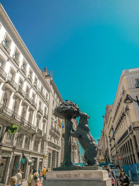 Madrid: Royal Palace, Old Town and Poets District Tour - Experience and Guide