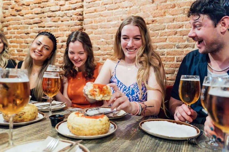 Madrid: Tapas Food Tour with 6 Tapas and 4 Drinks - Key Points