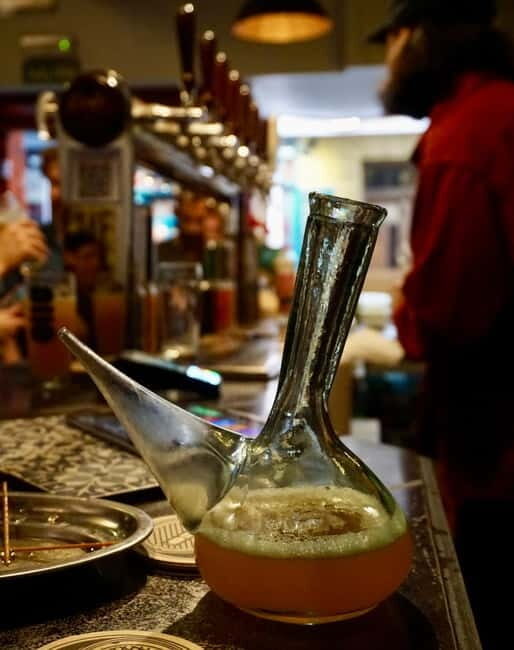 Madrid: Tapas, Vermouth & Wine Tour in La Latina - Third Stop: Muñiz – Madrid’s Iconic Stew and Spanish Wine