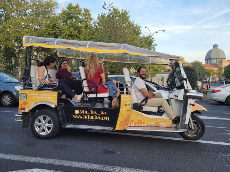 Madrid: Traditional Tour Wh Private Guide in Yellow Tuk Tuk - Tour Itinerary and Highlights