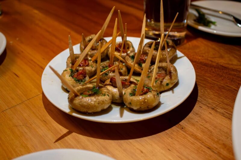Madrids Iconic Tapas, Taverns & History Experience - Taking in the Vibrant Tapas Culture