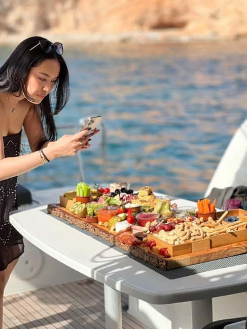 Majorca: Dinner aboard a private catamaran with snorkeling and paddle surfing - An In-Depth Look at the Mallorca Catamaran Experience