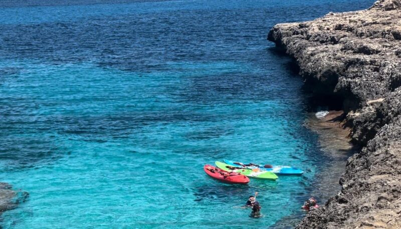 Mallorca: Kayak and Paddle Surf Excursion Through Crystal Clear Water Caves - Exploring Crystal Clear Water Caves