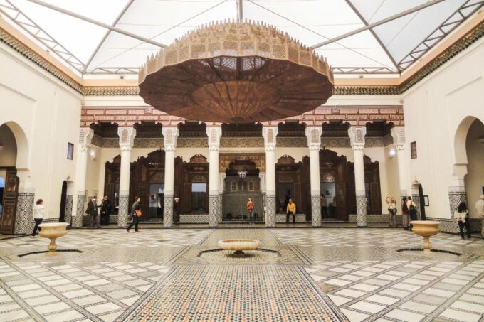 Marrakech: Madrasa Ben Youssef, Secret Garden & Market Tour - Tour Logistics and Accessibility