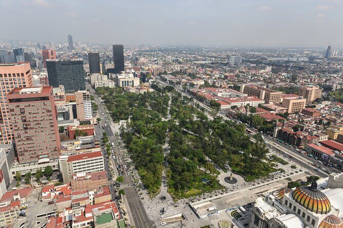 Mexico City Welcome Ride: Airport Pickup + 1-Hour City Highlights - Key Points