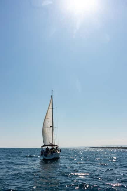 Monopoli: Sailing Tour with Aperitif, Sup and Snorkeling - Scenic Drive and Dolphin Watching
