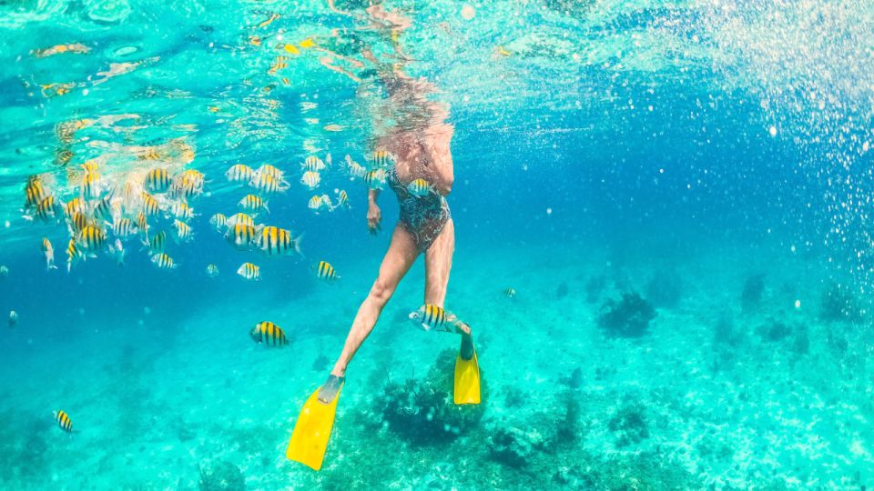 Montego Bay: Bamboo Rafting, Party Catamaran, and Snorkeling - Limestone Massage Treatment