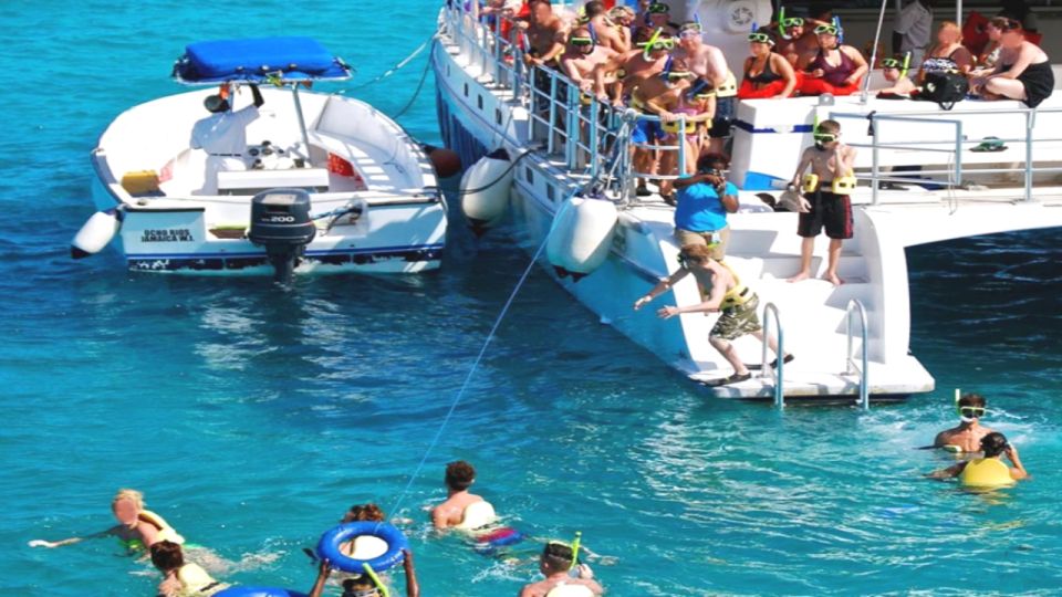 Montego Bay: Bamboo Rafting, Party Catamaran, and Snorkeling - Margaritaville Visit
