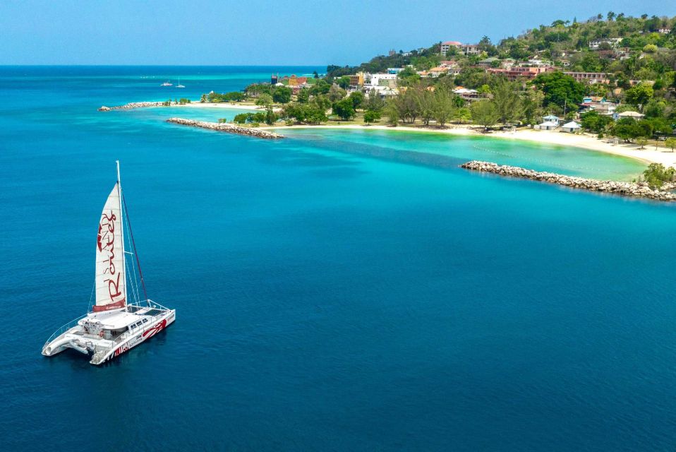 Montego Bay: Reggae Catamaran Cruise With Snorkeling - Catamaran Sail and Ambiance