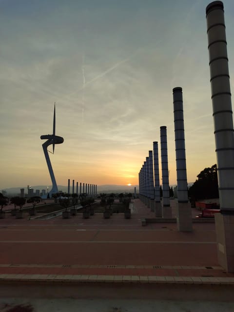 Montjuic Guided E-Bike Tour With Tapas and Panoramic Views - Visiting the Lluís Companys Olympic Stadium