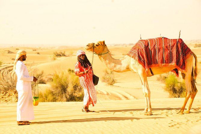 Morning Red Dunes Desert by Quad Bike, Dune Bashing, Camel Ride & Sandboarding - Camel Ride Journey