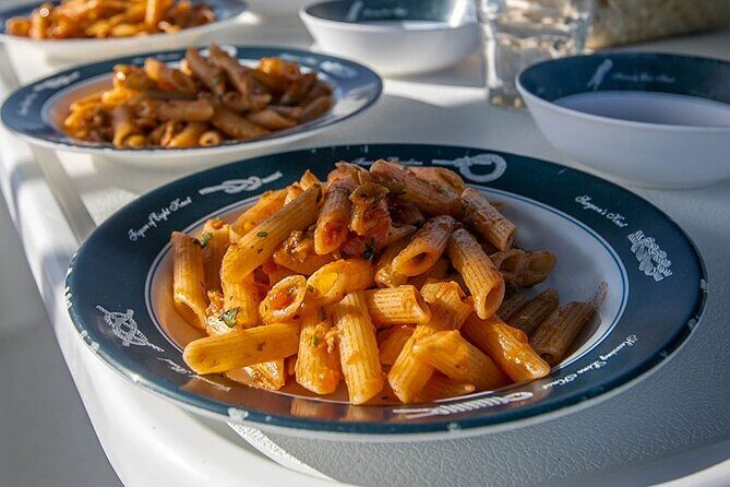 Mykonos Catamaran Delos Rhenia Cruise with Lunch and Transfer - The Sum Up