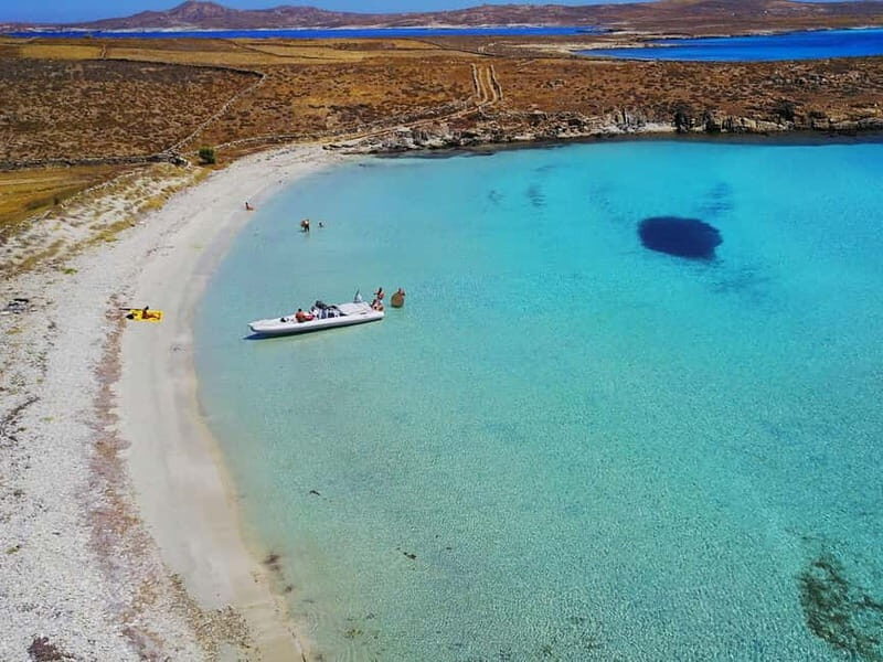 Mykonos: Delos and Rhenia Land Cruise with Fruit and Snacks - Cruising to Rhenia: The Beach Paradise