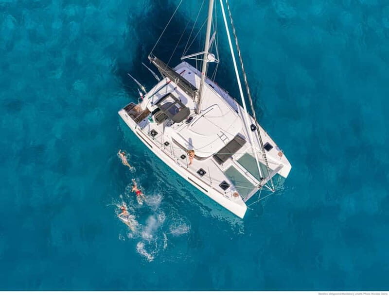 Mykonos: Rhenia Island Catamaran Cruise with Meal and Drinks - Key Points