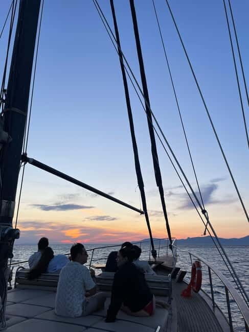 Mykonos: Sunset Boat Cruise with Light Dinner & Drinks - Key Points