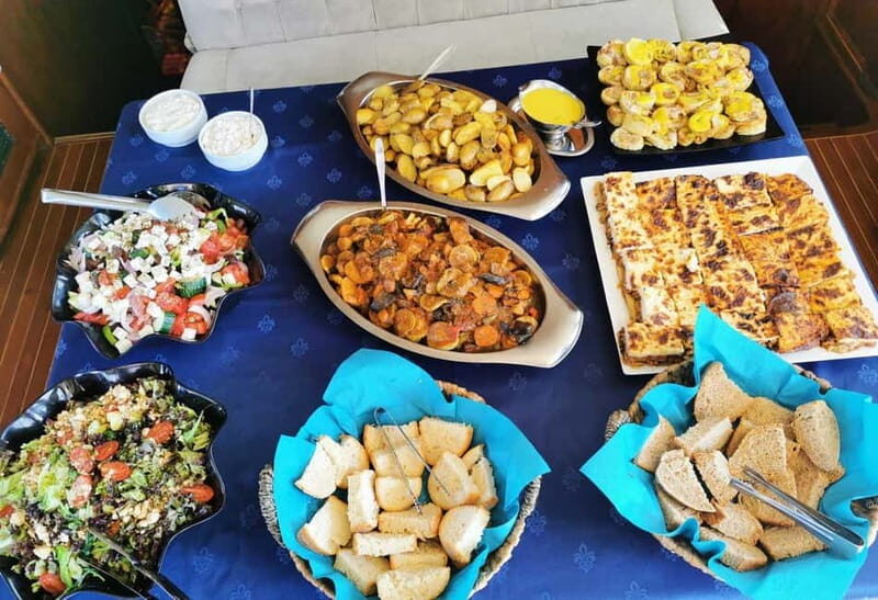 Mykonos: Sunset Sail Cruise to Rhenia with Beach and Dinner - The Sum Up