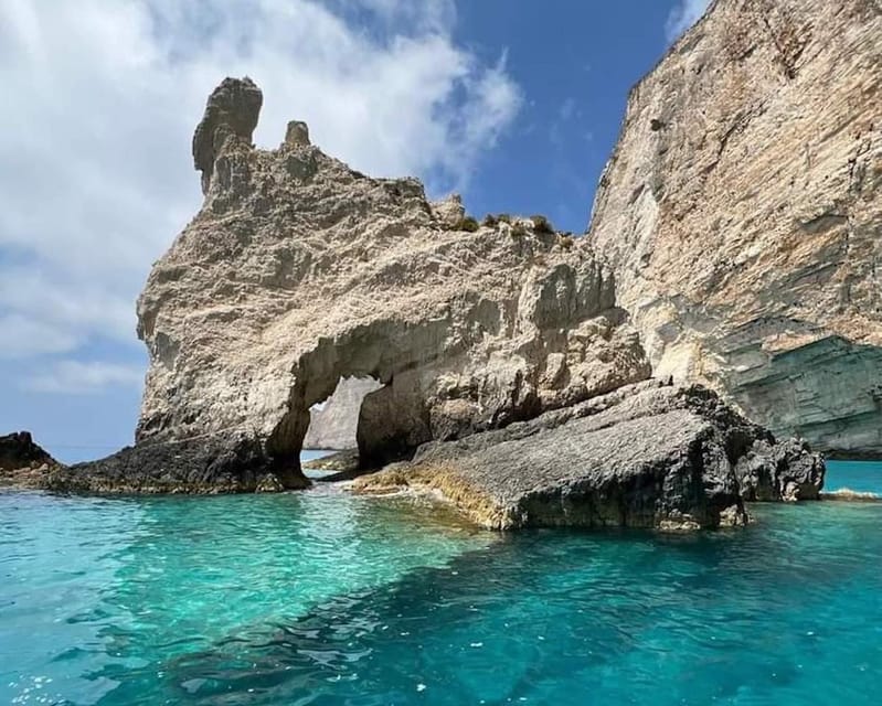 Navagio bay White Beach West Coast Porto Vromi Anafonitria - The Sum Up