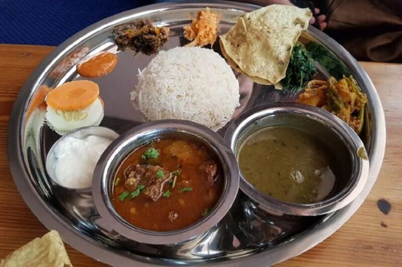 Nepalese Kitchen in Pokhara: Momos or Dal Bhat Cooking Class - Itinerary Overview