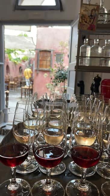 Oia: Wine Tasting with Cold Cuts or Cured Fish - Discovering the Essence of Greek Wines