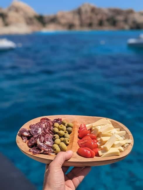 Olbia: Aperitif with Dolphin Watching & Snorkeling Boat Trip - FAQ  