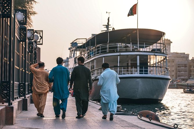 Old Dubai Walking Tour: Abra Ride, Creek, Spice & Gold Souks. - Abra Ride Across Dubai Creek