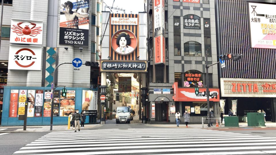 Osaka: Private Guided Tour of the Modern City - Admiring Dotonboris Iconic Landmarks