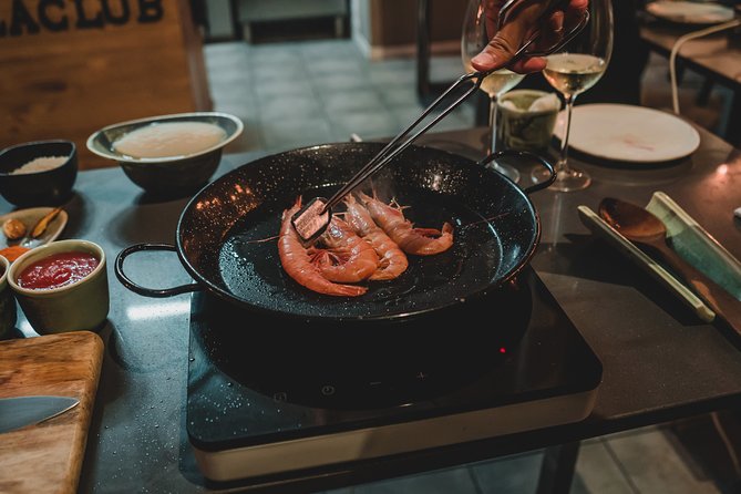 Paella Experience and Bottomless Wine in Barcelona - Meal Details and Dining Experience