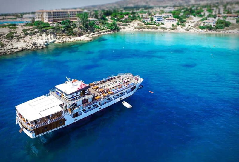 Paphos: All-Inclusive Yacht Cruise to Coral Bay with Stops - Entertainment and Atmosphere