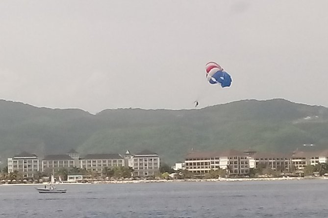 Parasailing Snorkeling and Glass Boat Adventure in Negril - Thrilling Parasailing Experience