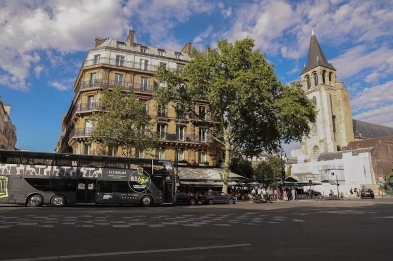 Paris: Bus Tour of St Germain With Lunch & Champagne Glass - Key Points