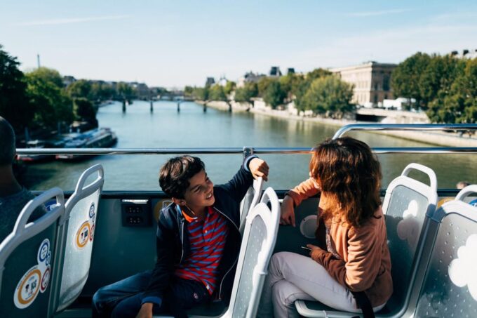 Paris: Hop-On Hop-Off Bus With Cruise and Versailles Options - Multilingual Audio Guide Experience