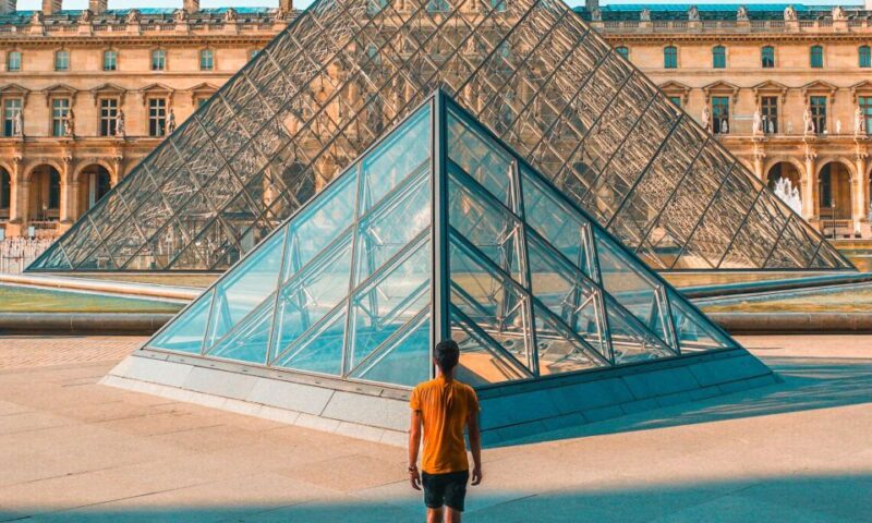 Paris: Louvre Museum Ticket and Bus Tour With Audio Guide - Key Points