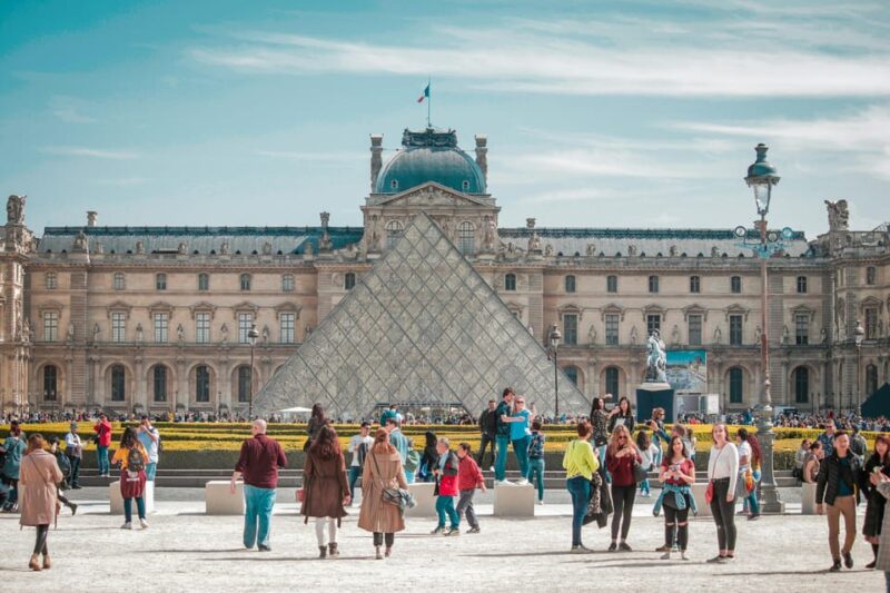 Paris: Louvre Museum Timed Entry Ticket & Pop Culture Tour - Access and Experience