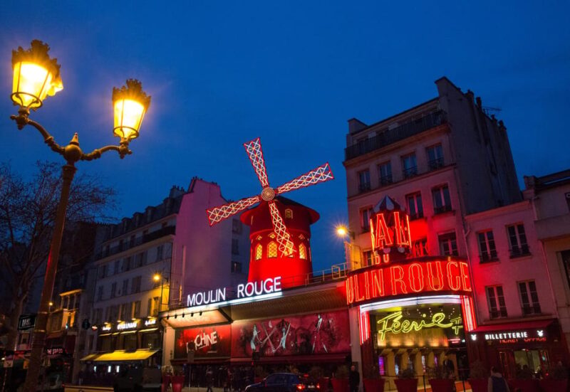 Paris: Moulin Rouge Show With Champagne and Drop-Off Service - Spectacular Costumes and Performances