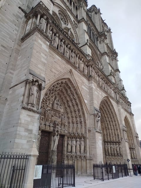 Paris: Notre Dame Cathedral Guided Tour of the Neighborhood - Experience and Features